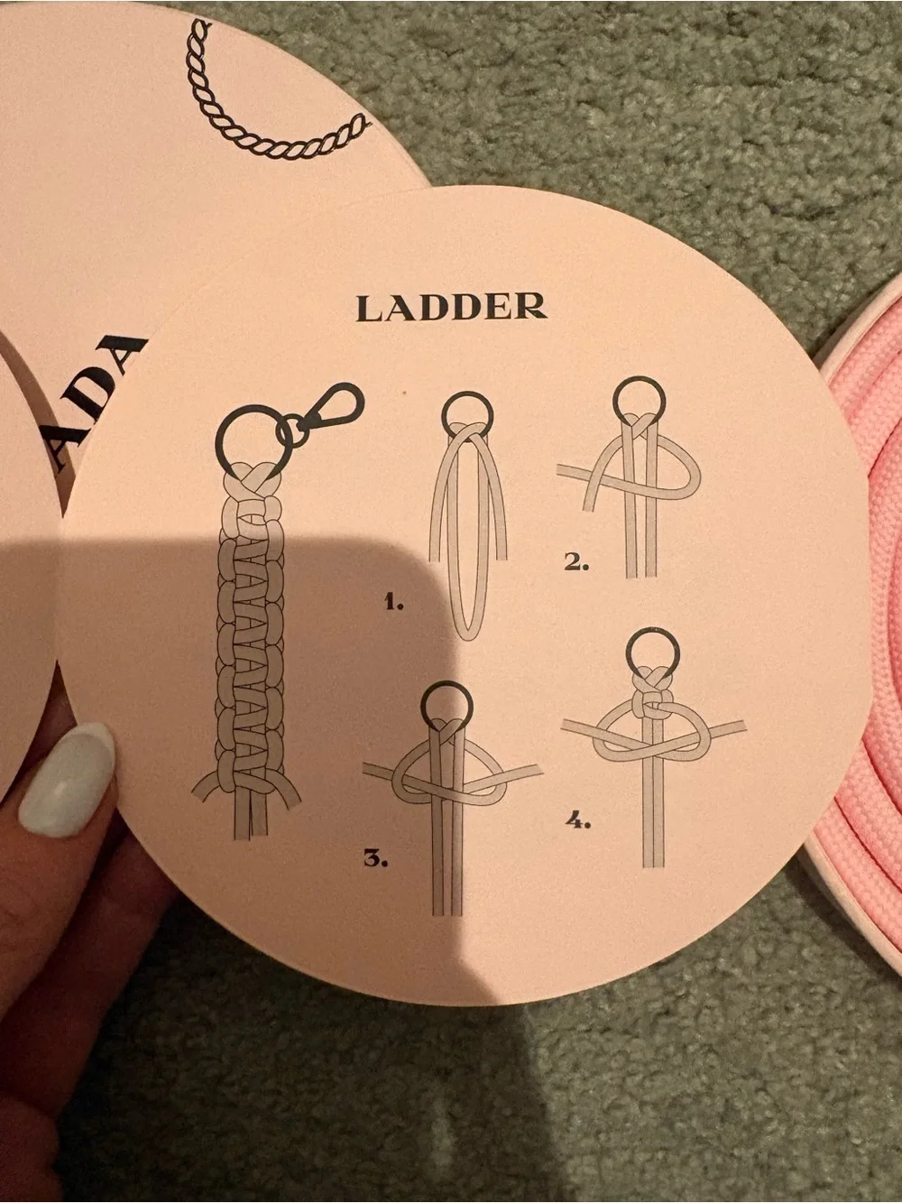 Prada Pink Round Box with Black Rope Motif